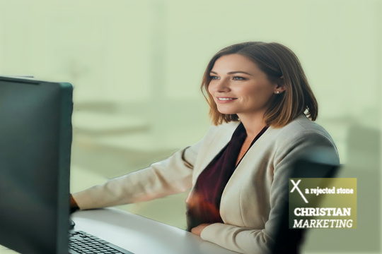 Young business professional pleased with her marketing results